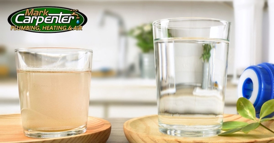 glass of dirty water next to glass of clean water