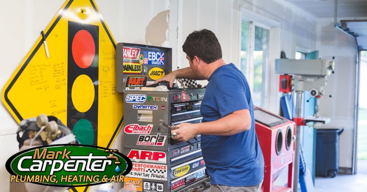 man looking for tool in garage